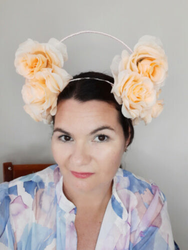 A picture of an Apricot Floral Crown by Melissa Rath Millinery.