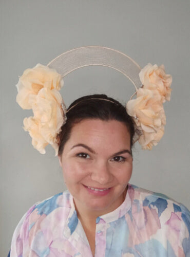 A picture of an Apricot Halo Crown by Melissa Rath Millinery