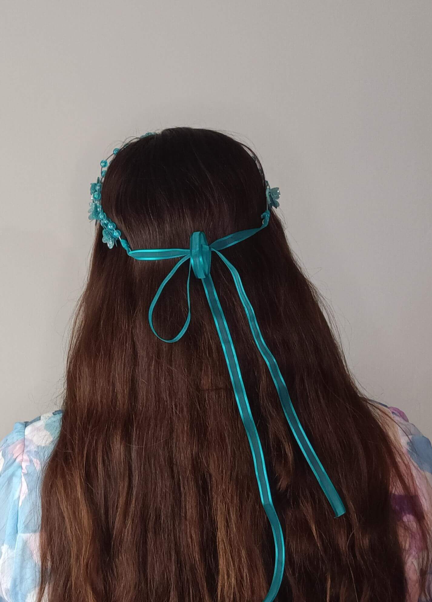 A picture of an Aqua Beaded Halo by Melissa Rath Millinery