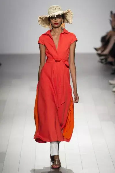 A picture of a model on the catwalk for Badgley Mischka FW 2022.