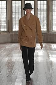 A picture of a model on the catwalk for Badgley Mischka FW 2022.