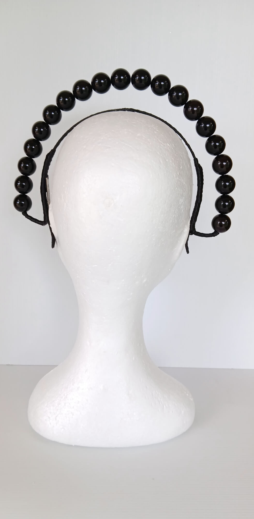 A picture of a Black Beaded Headband by Melissa Rath Millinery.