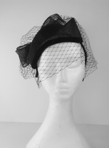 A black Veiled Millinery Beret by Melisa Rath Millinery.
