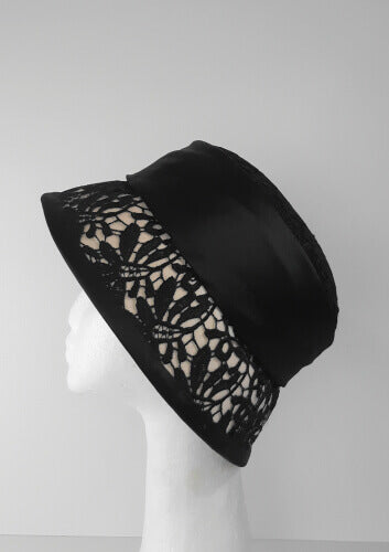 A picture of a Black and White Coche by Melissa Rath Millinery.