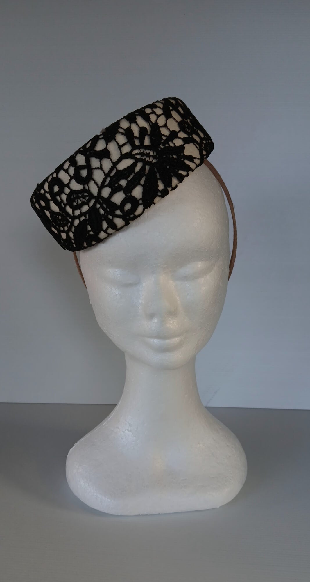 A picture of a Black and White Felt Millinery Pillbox Hat by Melissa Rath Millinery.