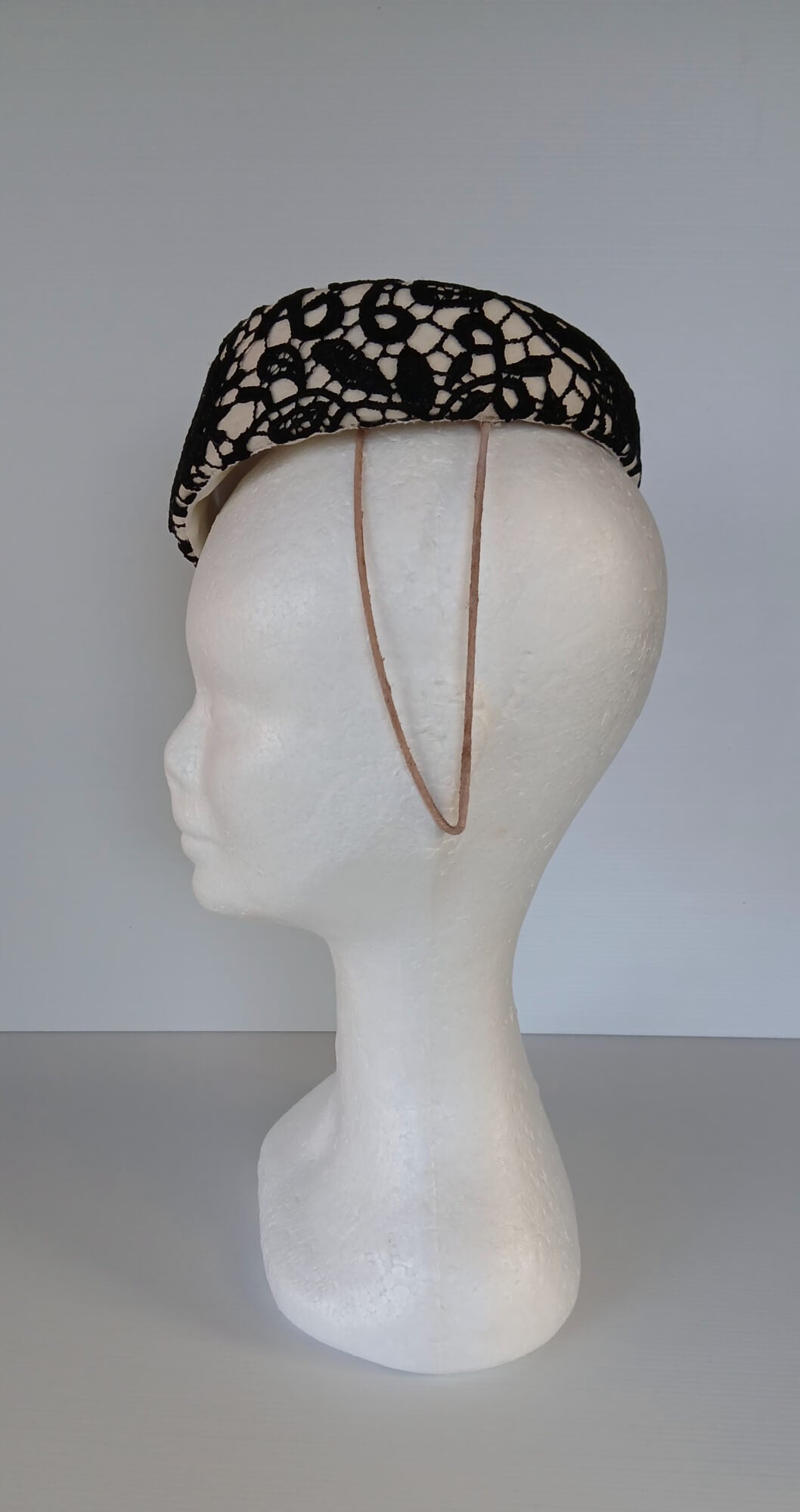 A picture of a Black and White Felt Millinery Pillbox Hat by Melissa Rath Millinery.