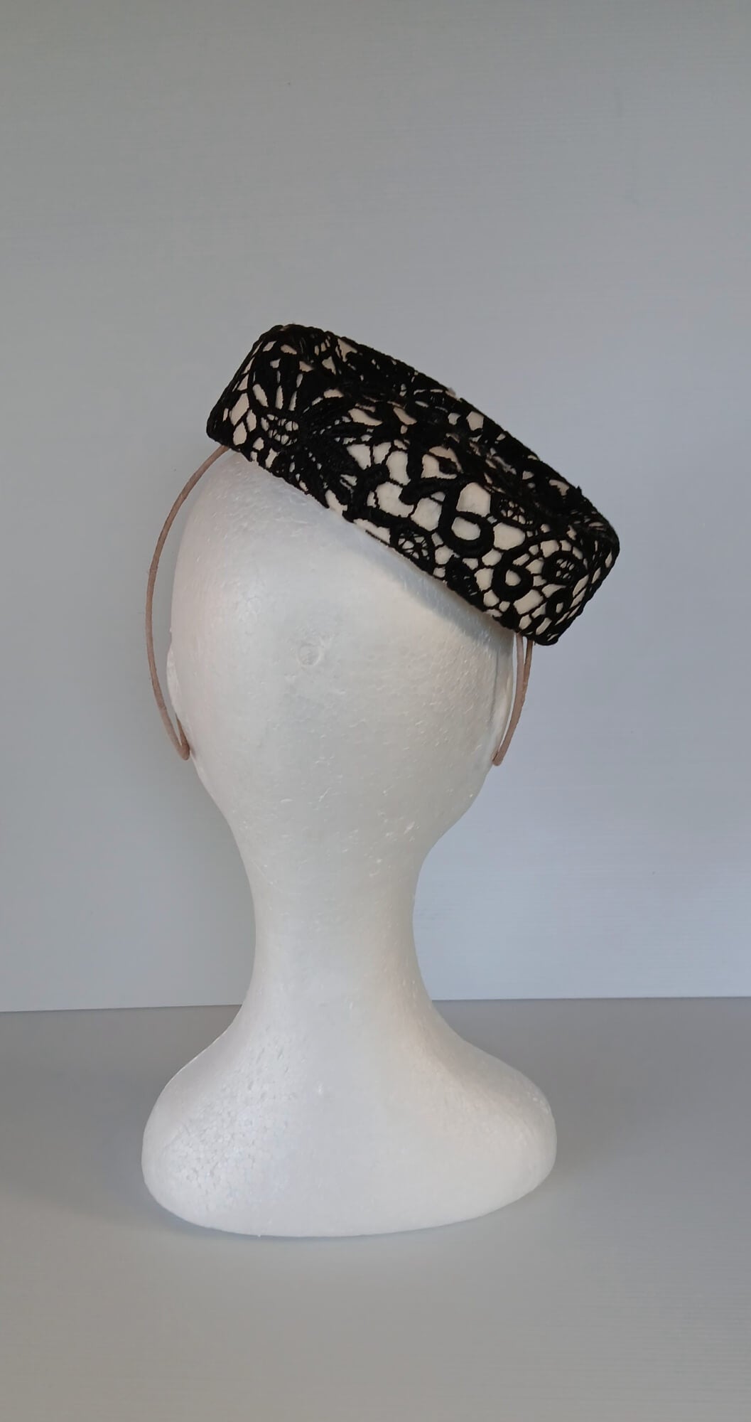 A picture of a Black and White Felt Millinery Pillbox Hat by Melissa Rath Millinery.