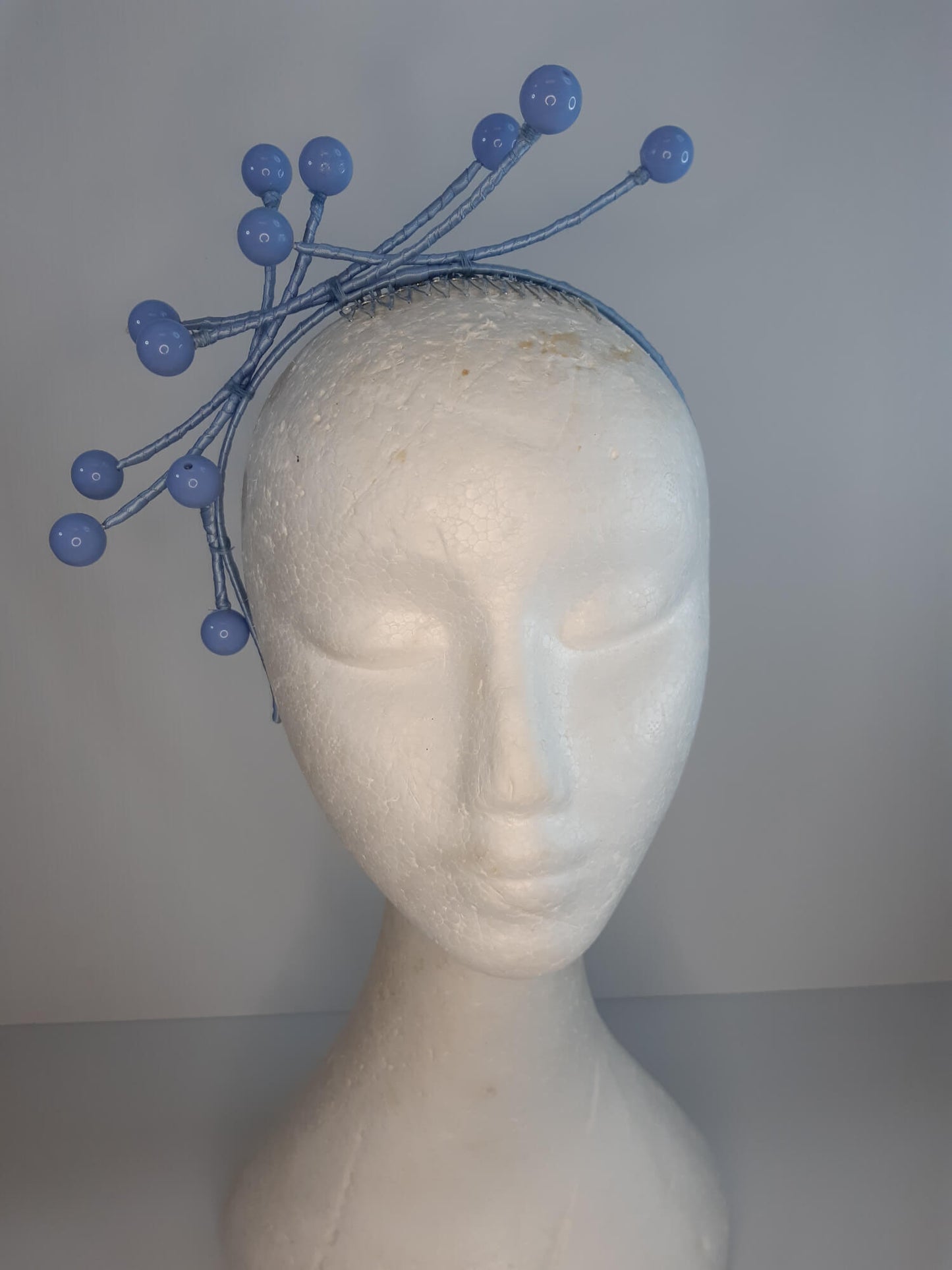 A picture of a Blue Beaded Headband by Melissa Rath Millinery.
