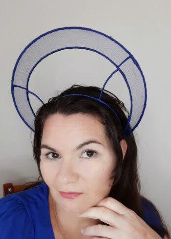 A picture of a blue millinery halo by Melissa Rath Millinery.