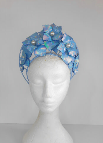 A picture of a Blue Pleather Millinery Crown by Melissa Rath Millinery.