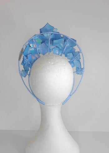 A picture of a Blue Pleather Millinery Crown by Melissa Rath Millinery.