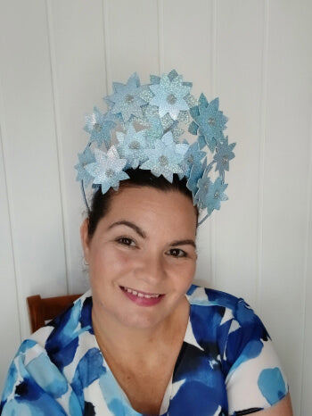 A picture is a Blue Pleather Millinery Crown by Melissa Rath Millinery.