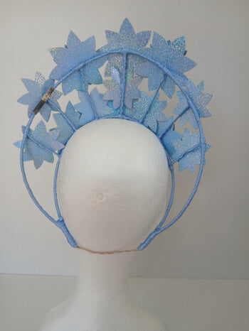 A picture is a Blue Pleather Millinery Crown by Melissa Rath Millinery.