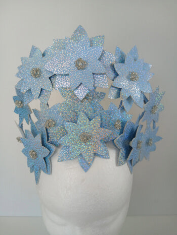 A picture is a Blue Pleather Millinery Crown by Melissa Rath Millinery.
