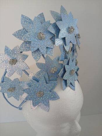 A picture is a Blue Pleather Millinery Crown by Melissa Rath Millinery.