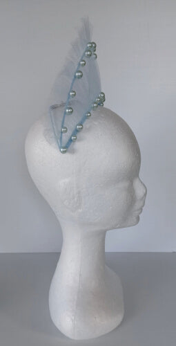 A picture of a light blue millinery crown by Melissa Rath Millinery.