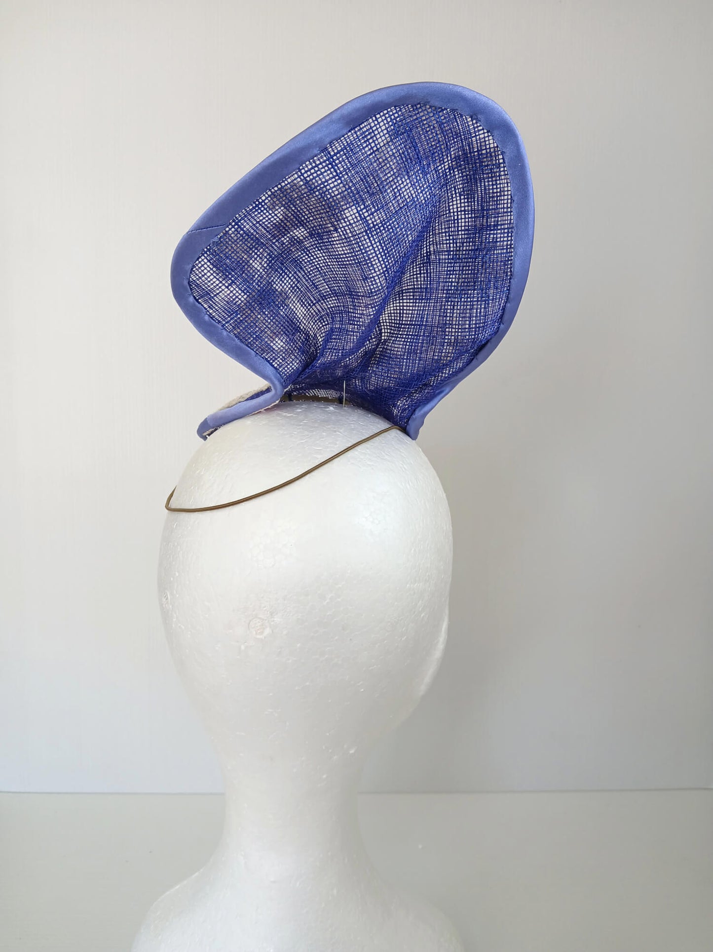 A picture of a Blue and White Sculptured Millinery Fascinator by Melissa Rath Millinery.