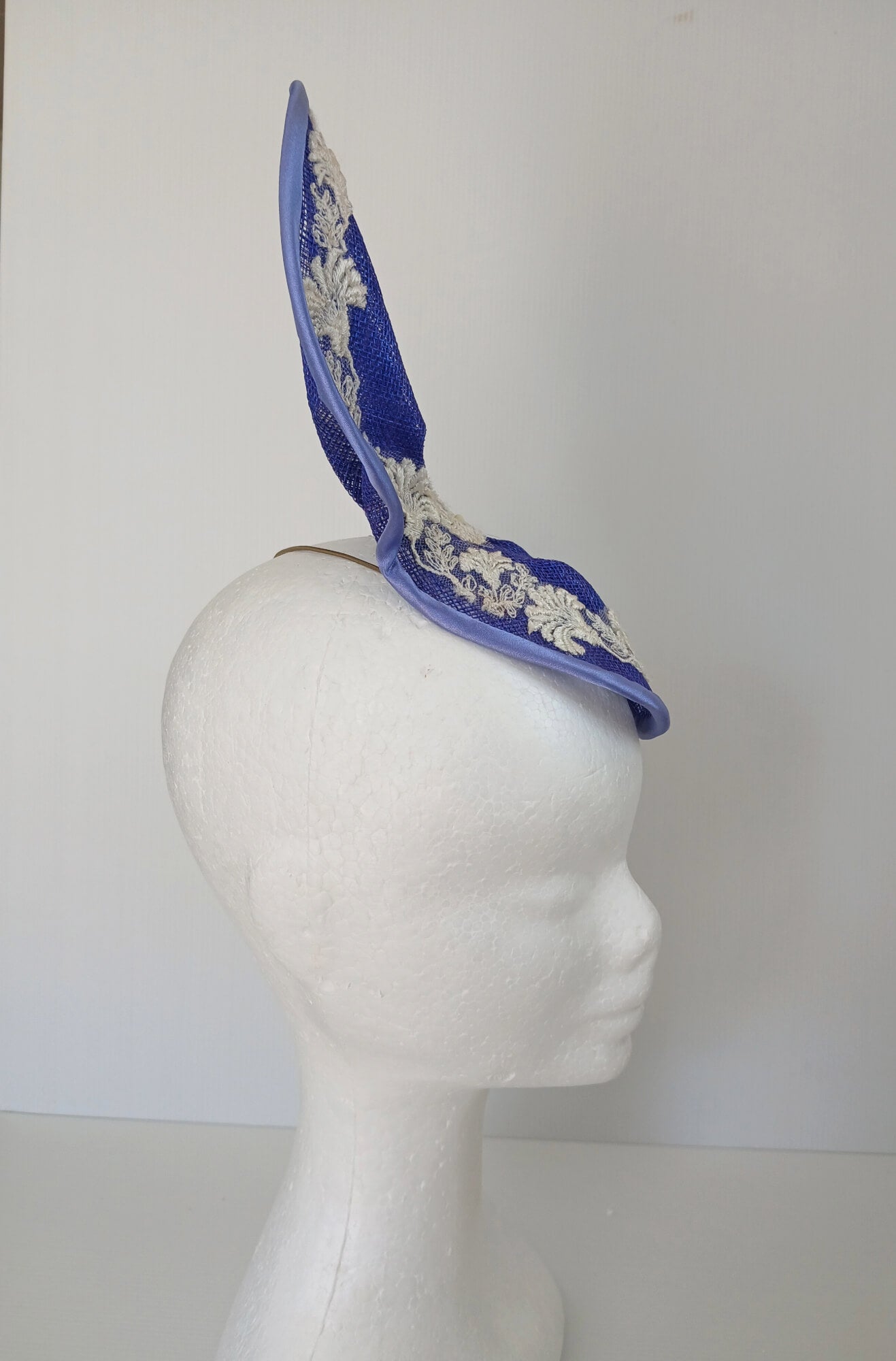 A picture of a Blue and White Sculptured Millinery Fascinator by Melissa Rath Millinery.