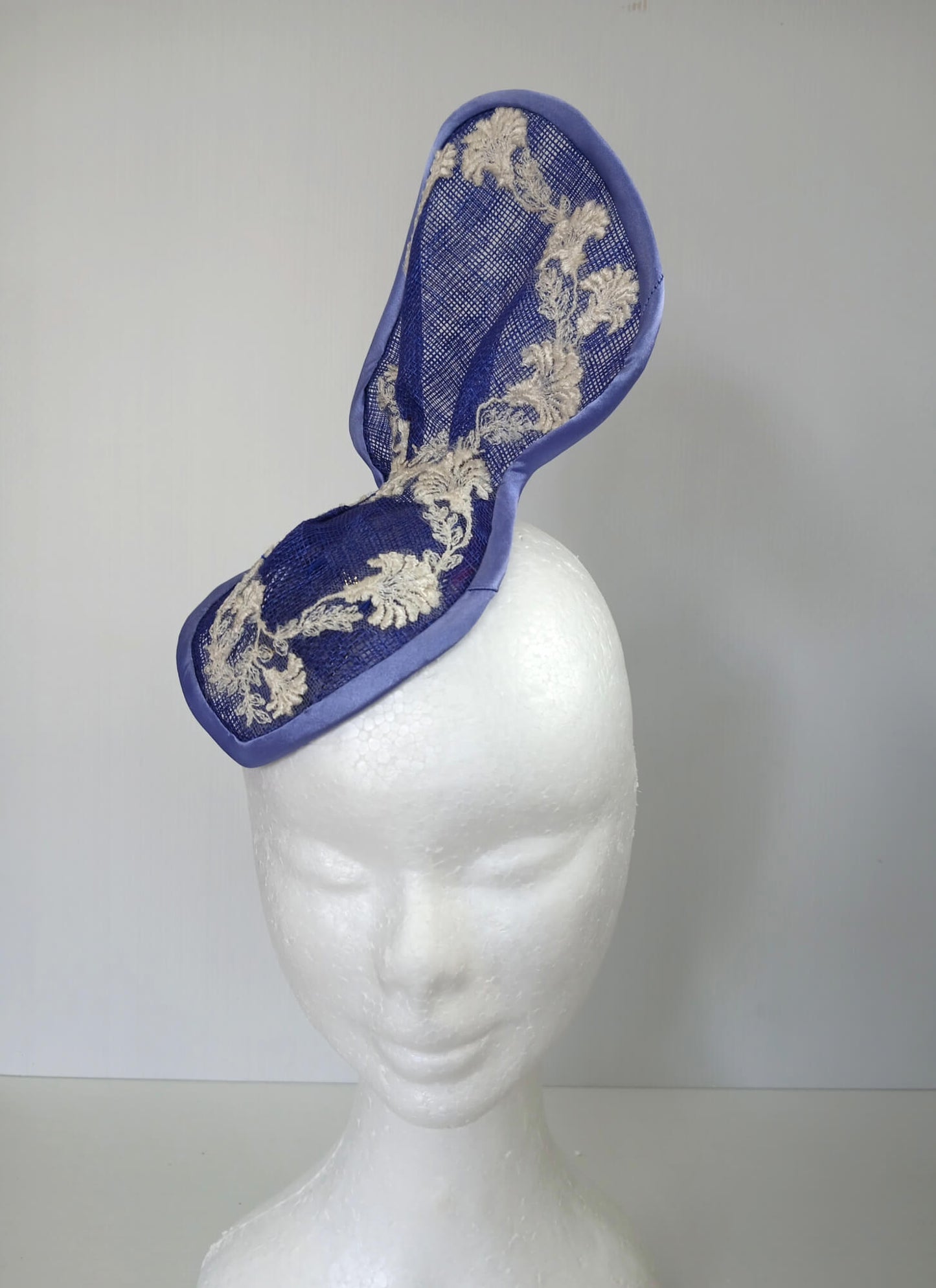 A picture of a Blue and White Sculptured Millinery Fascinator by Melissa Rath Millinery.