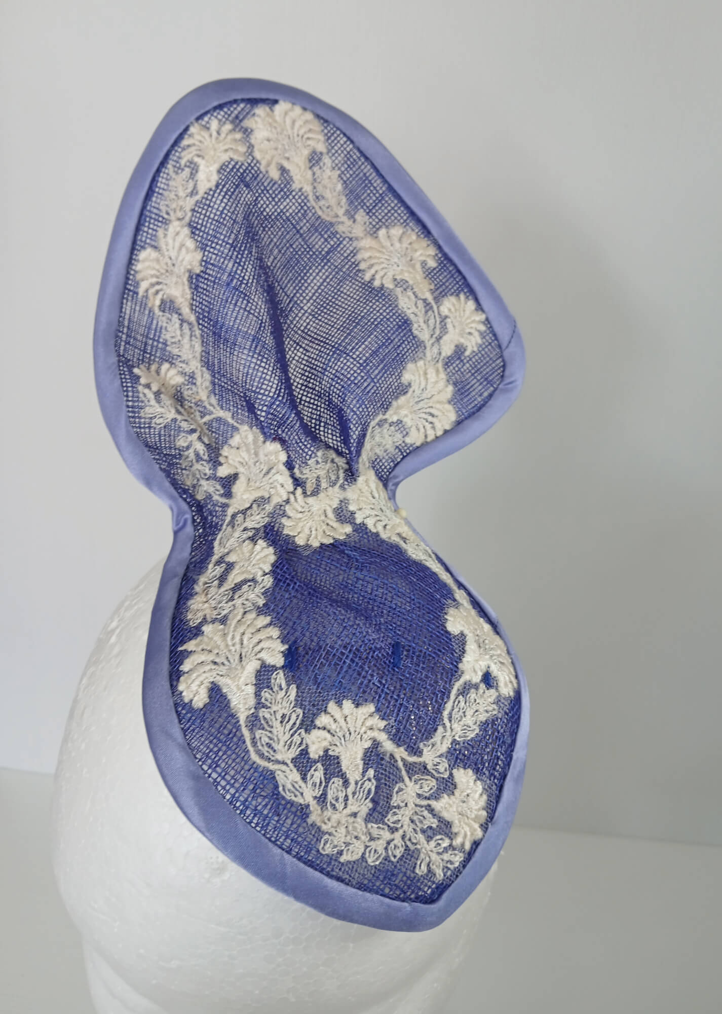 A picture of a Blue and White Sculptured Millinery Fascinator by Melissa Rath Millinery.