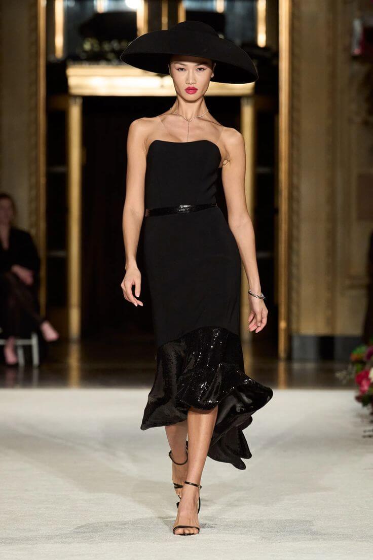 A picture of a model on the catwalk for  Christian Siriano FW 2023.