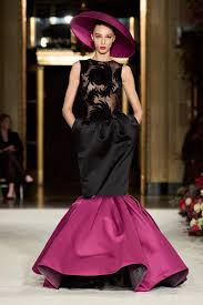 A picture of a model on the catwalk for  Christian Siriano FW 2023.