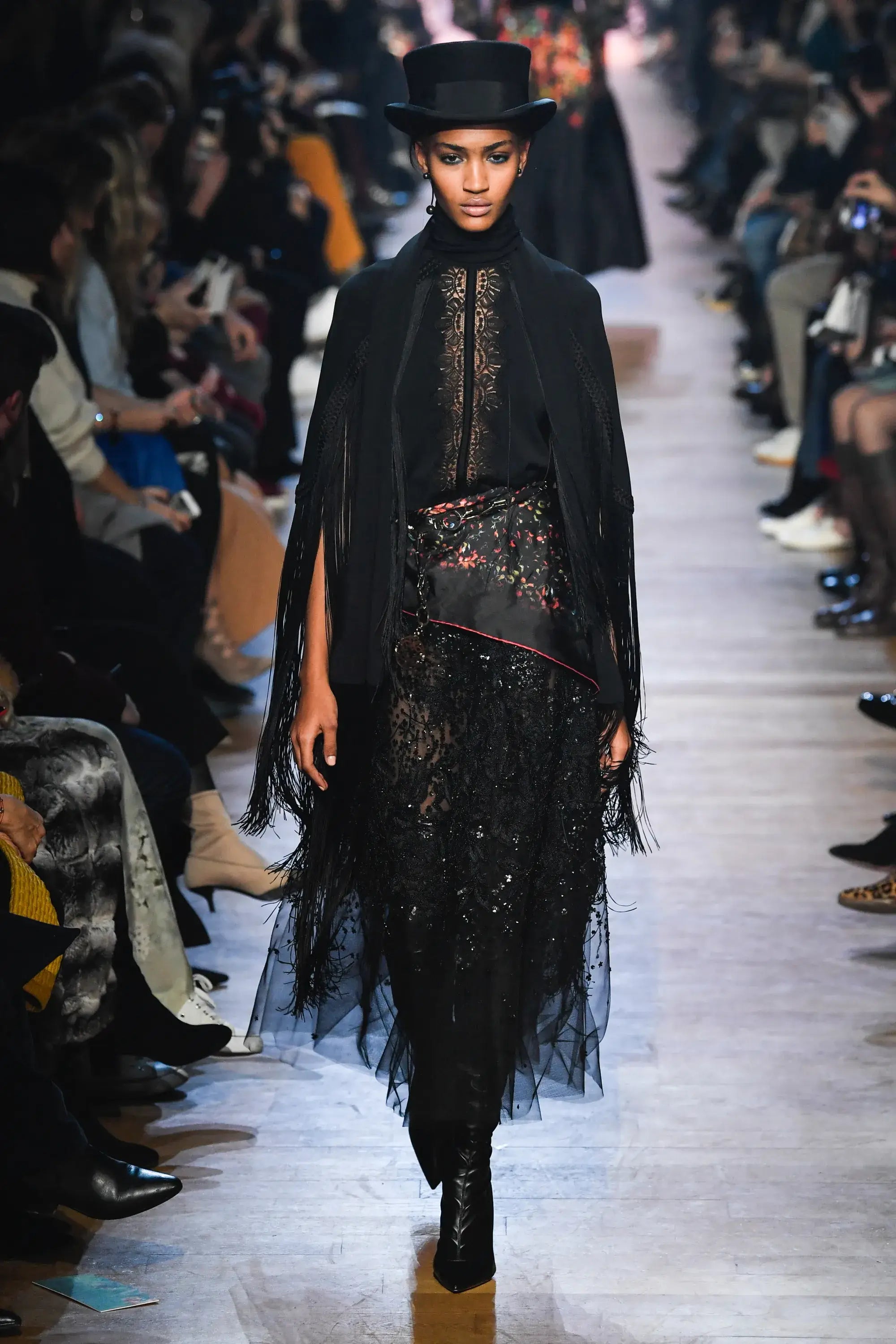 A picture of a model on the catwalk for Elie Saab AW 2018.