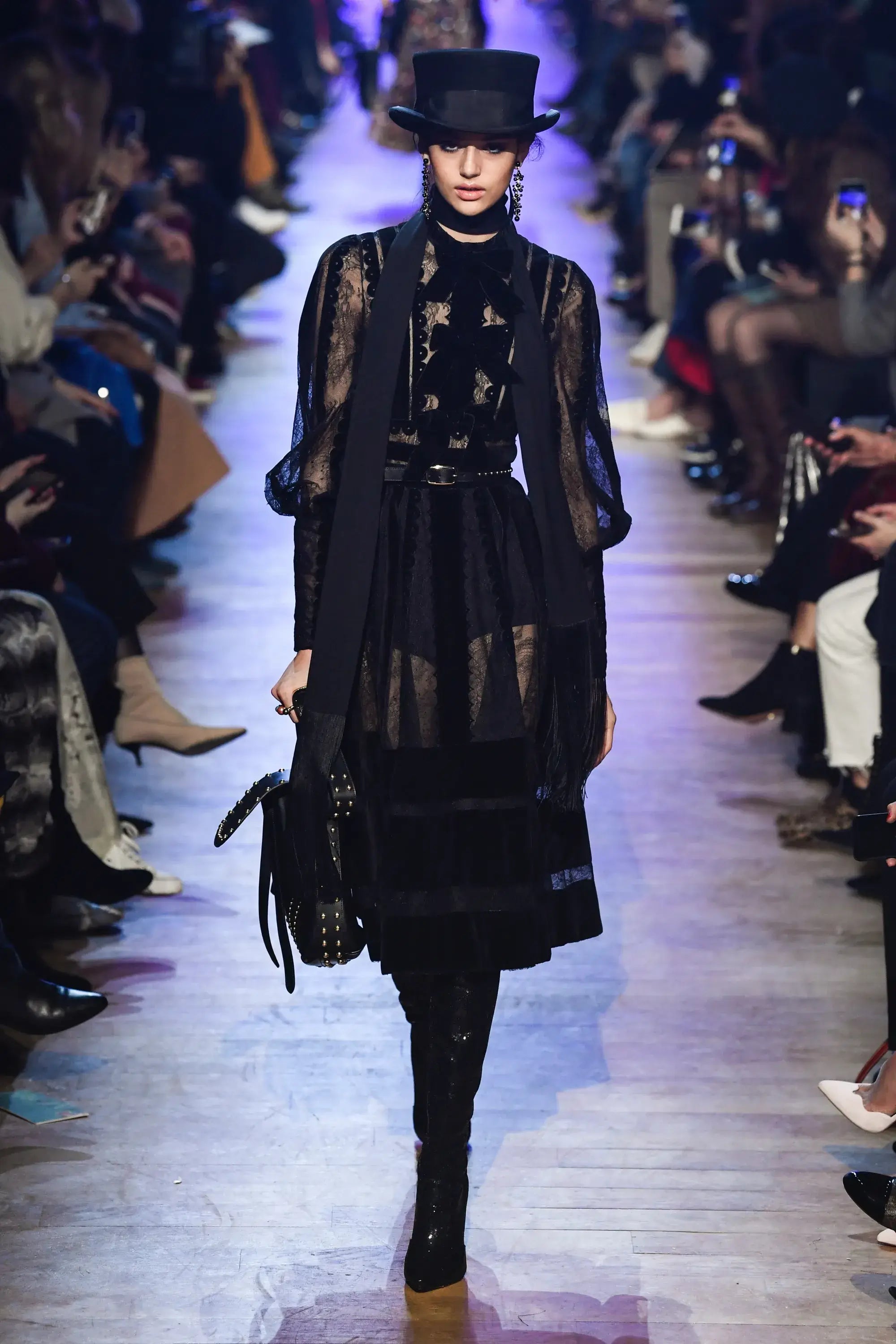 A picture of a model on the catwalk for Elie Saab AW 2018.