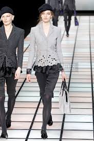 A picture of a model on the catwalk for  Emporio Armani AW 2012.