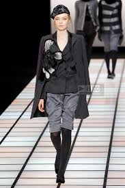 A picture of a model on the catwalk for  Emporio Armani AW 2012.