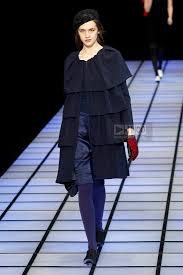 A picture of a model on the catwalk for  Emporio Armani AW 2012.
