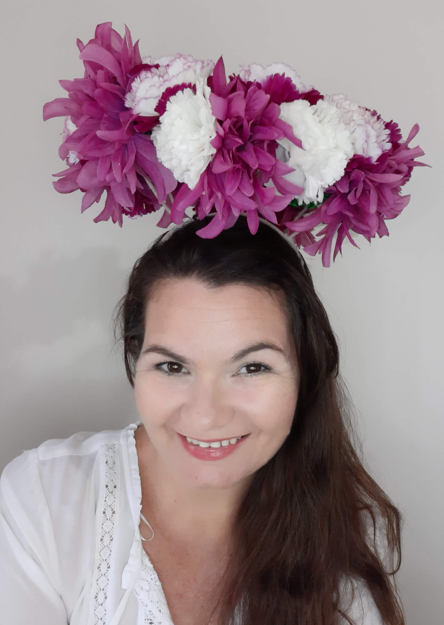 A picture of a floral floating millinery halo by Melissa Rath Millinery.