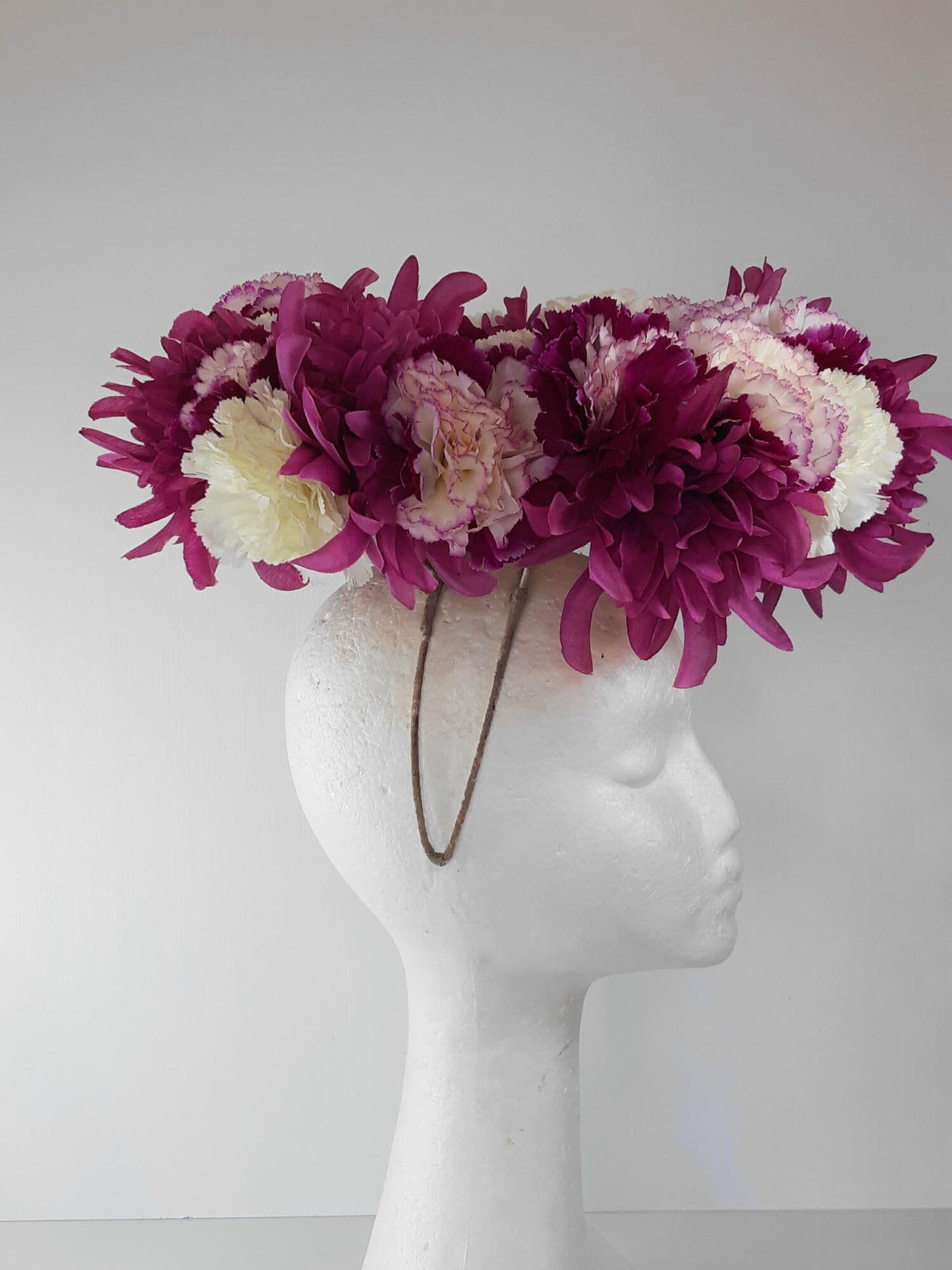 A picture of a floral floating millinery halo by Melissa Rath Millinery.