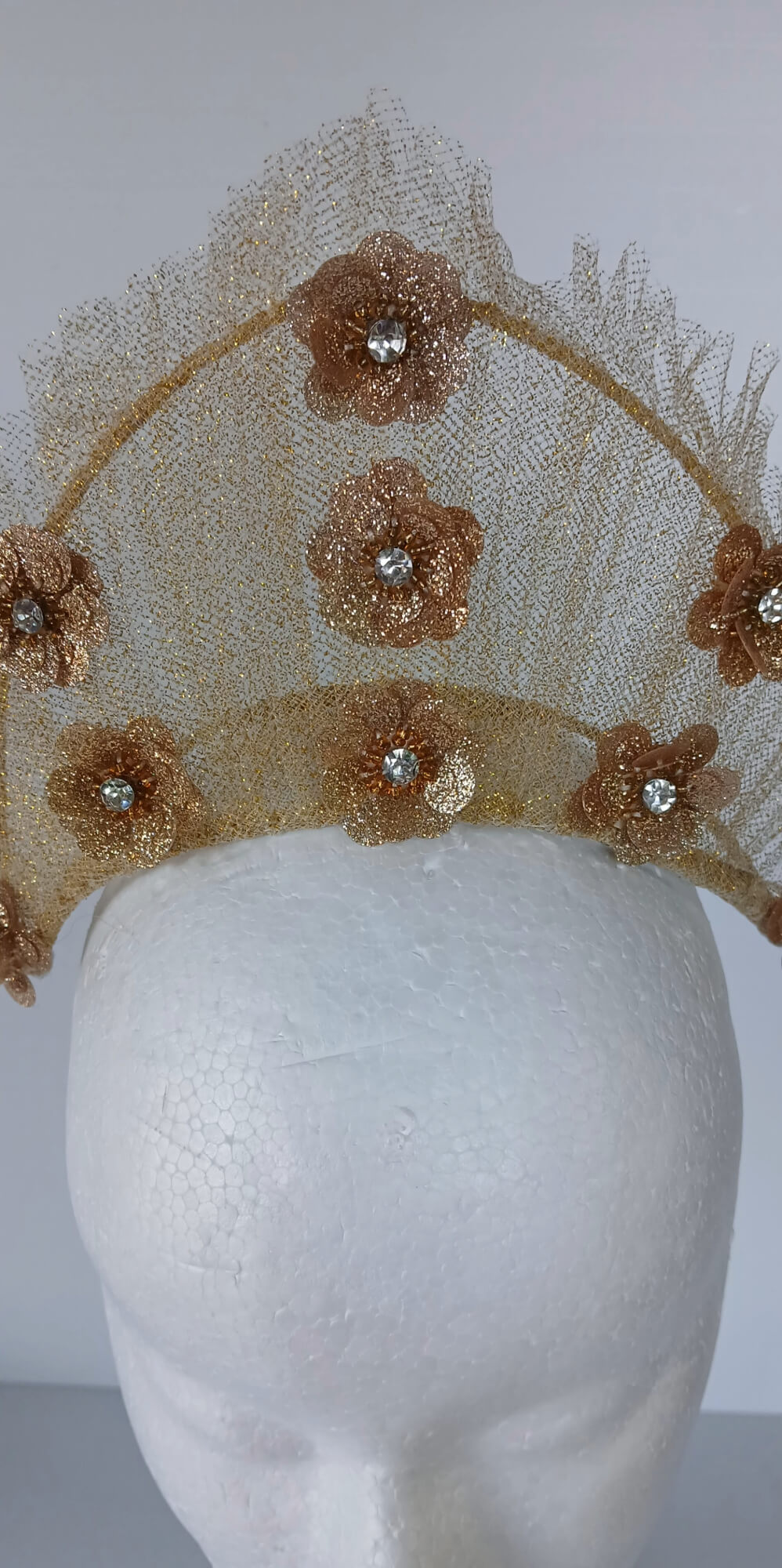 A picture of a Gold Tulle Crown by Melissa Rath Millinery