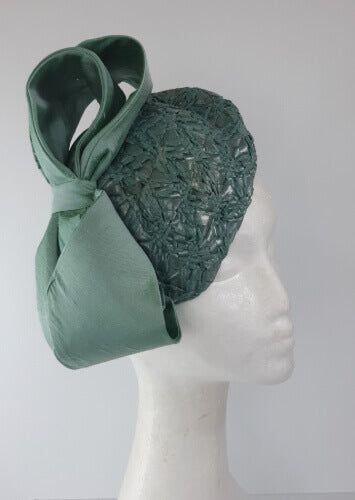 A picture of a Green Braided Millinery Beret by Melissa Rath Millinery.