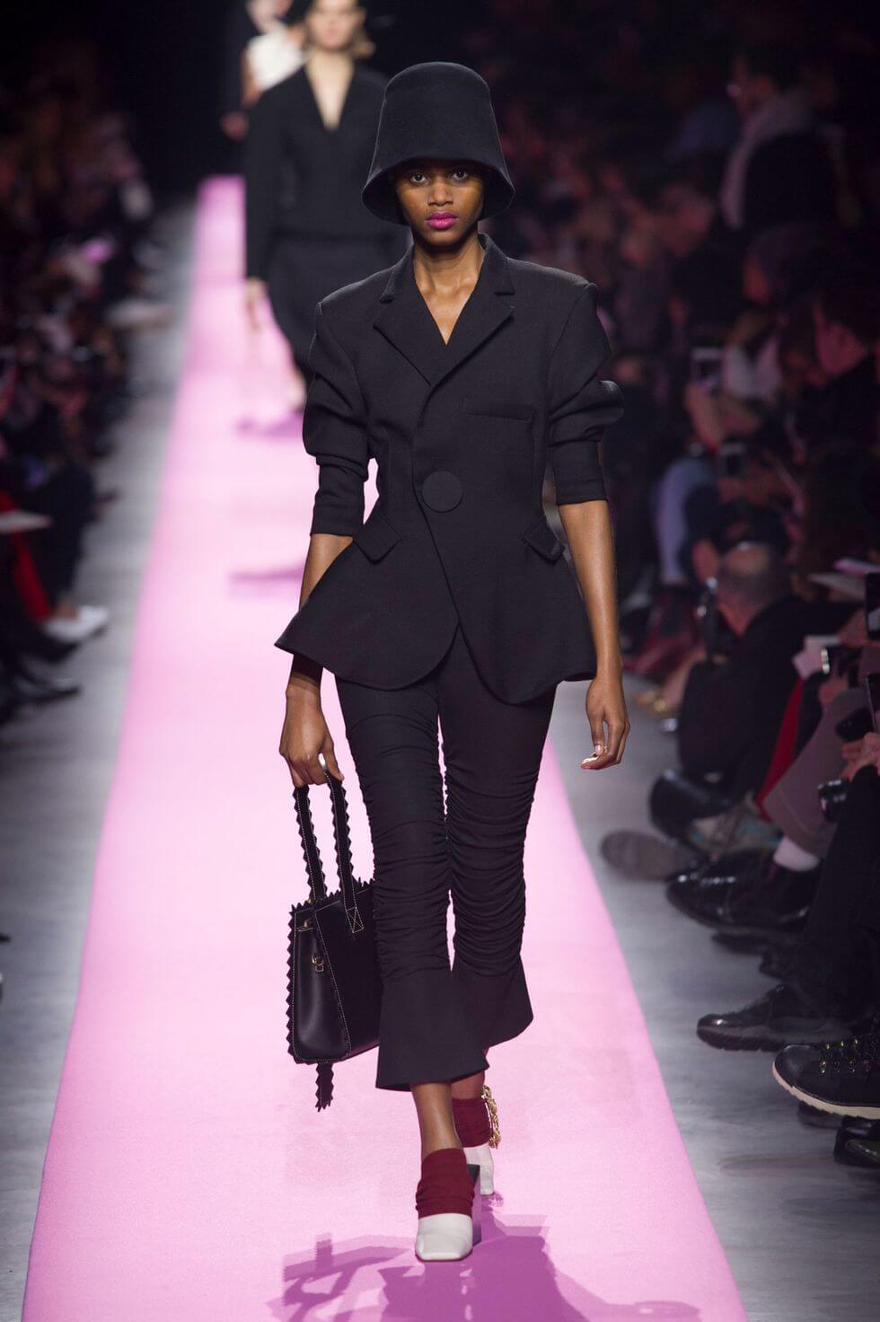 A picture of a model on the catwalk for  Jacquemus AW 2017.