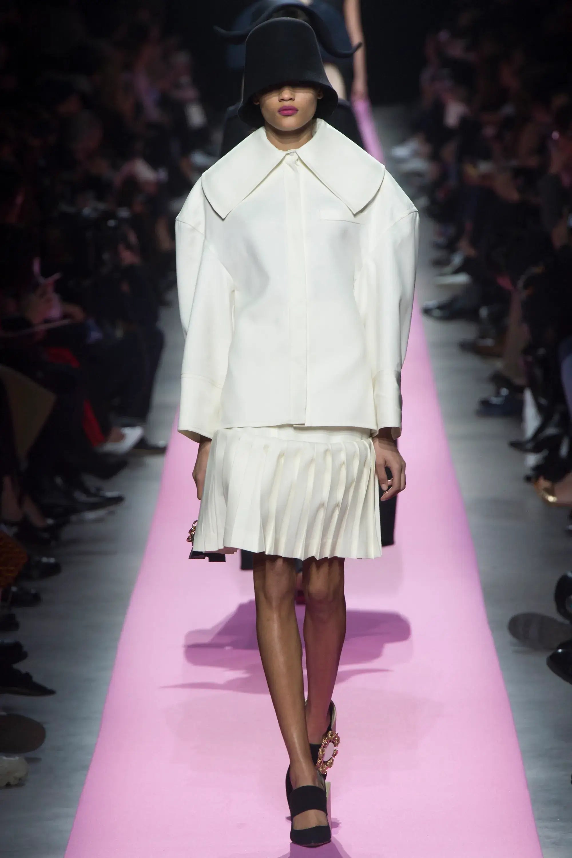 A picture of a model on the catwalk for  Jacquemus AW 2017.