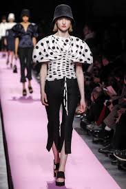 A picture of a model on the catwalk for  Jacquemus AW 2017.