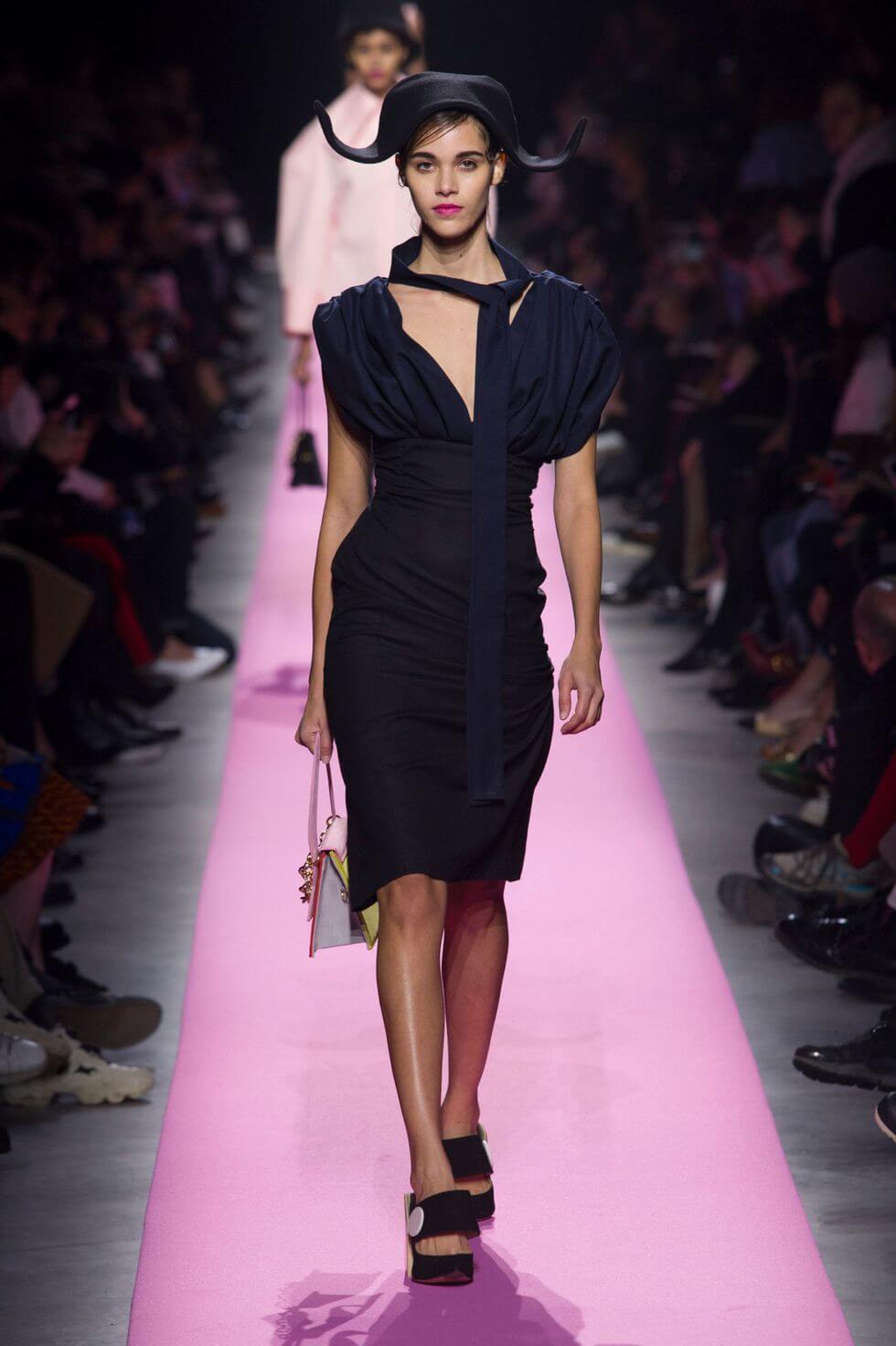 A picture of a model on the catwalk for  Jacquemus AW 2017.