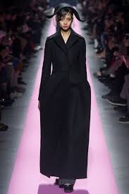 A picture of a model on the catwalk for  Jacquemus AW 2017.