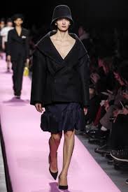 A picture of a model on the catwalk for  Jacquemus AW 2017.