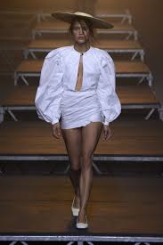 A picture of a model on the catwalk for  Jacquemus SS 2017.