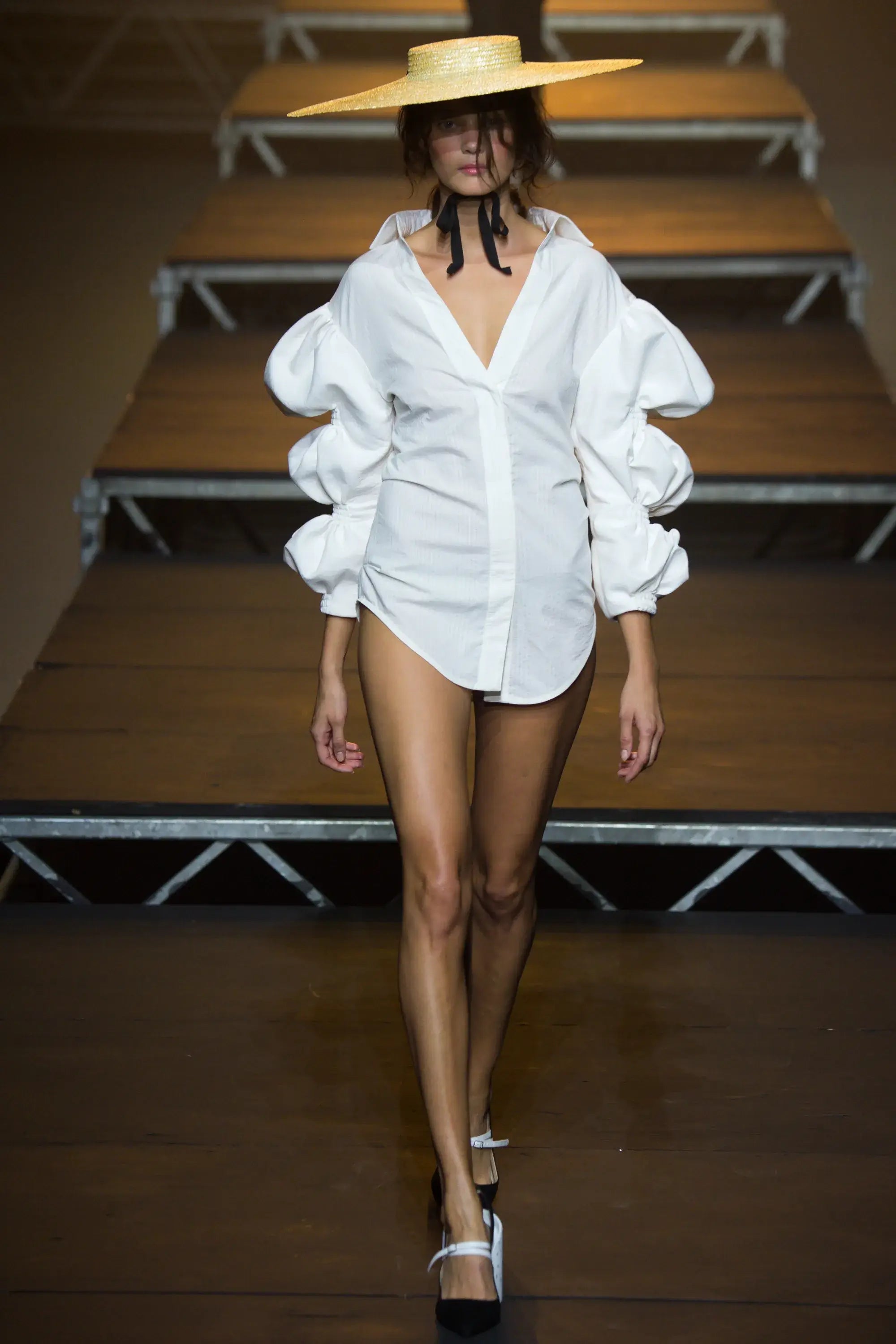 A picture of a model on the catwalk for  Jacquemus SS 2017.