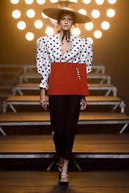 A picture of a model on the catwalk for  Jacquemus SS 2017.