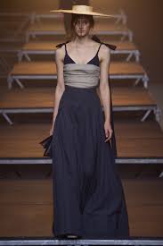 A picture of a model on the catwalk for  Jacquemus SS 2017.