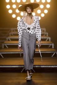 A picture of a model on the catwalk for  Jacquemus SS 2017.