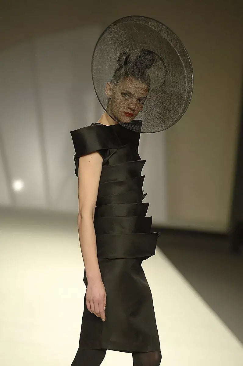 A picture of a model on the catwalk for  Juanjo Olivia AW 2009.