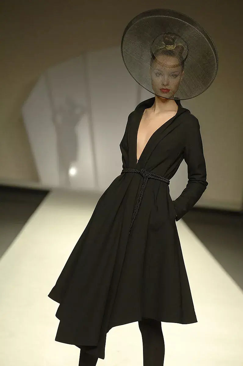 A picture of a model on the catwalk for  Juanjo Olivia AW 2009.