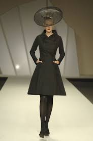 A picture of a model on the catwalk for  Juanjo Olivia AW 2009.
