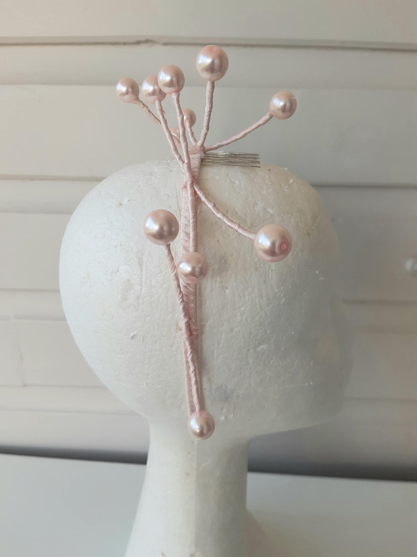 A picture of a Pink Beaded Millinery Headband by Melissa Rath Millinery.